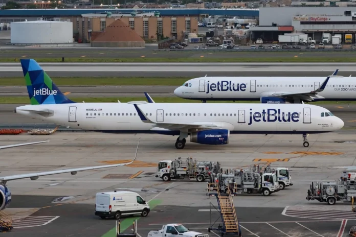 jetblue-passenger-strips-at-boston-airport,-dragged-off-by-police jetblue-passenger-strips-at-boston-airport,-dragged-off-by-police