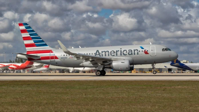 american-airlines-first-class-passenger-trapped-by-100-pound-dog